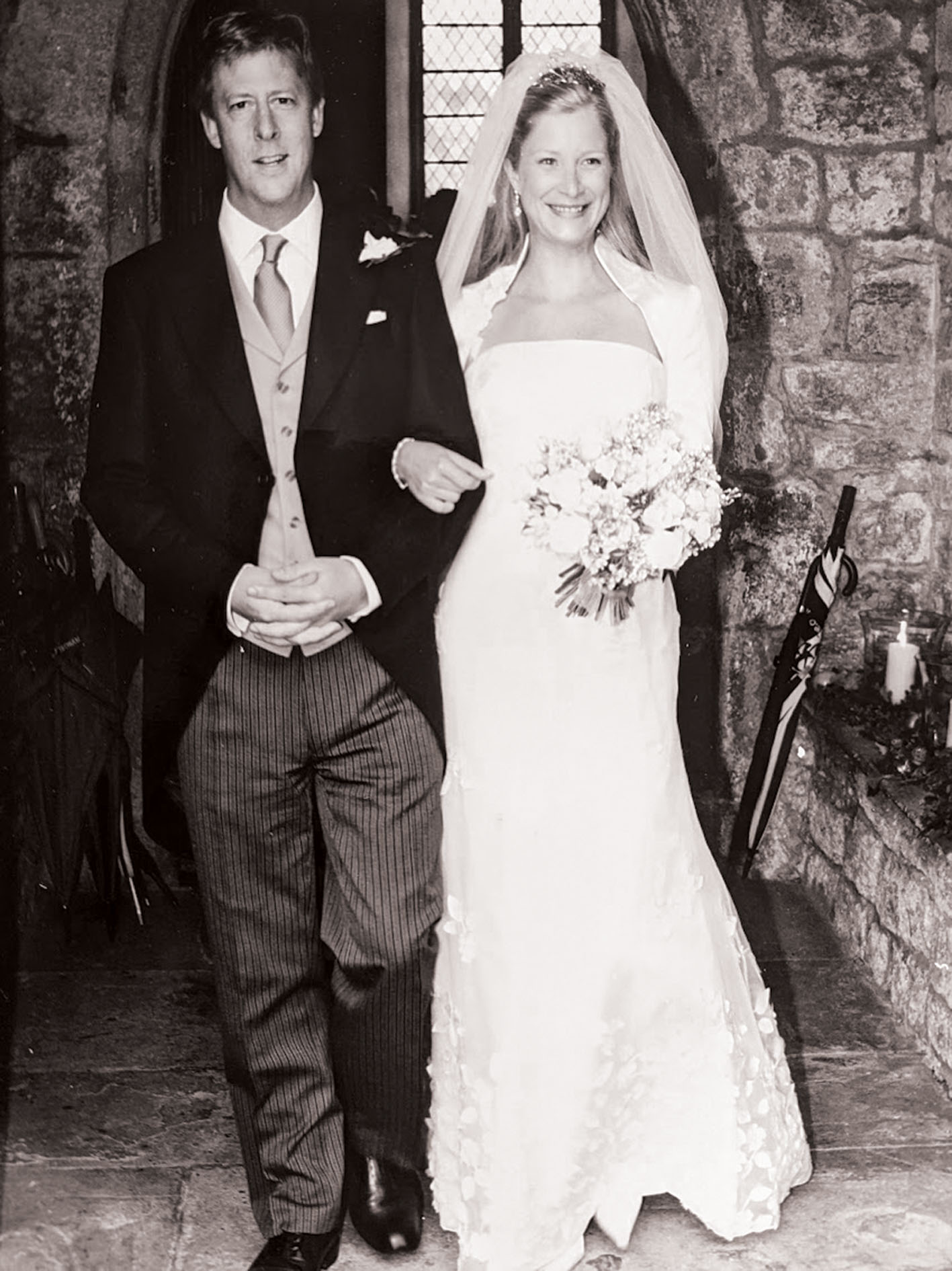 a couple leaving the church after their wedding